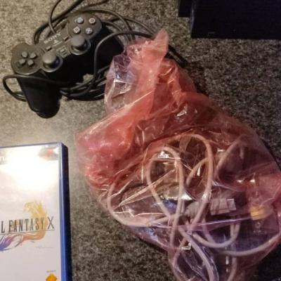 Playstation 2 mit Spiel abzugeben - thumb