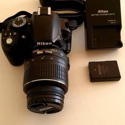Nikon d3100 + Nikkor 18-55mm - thumb