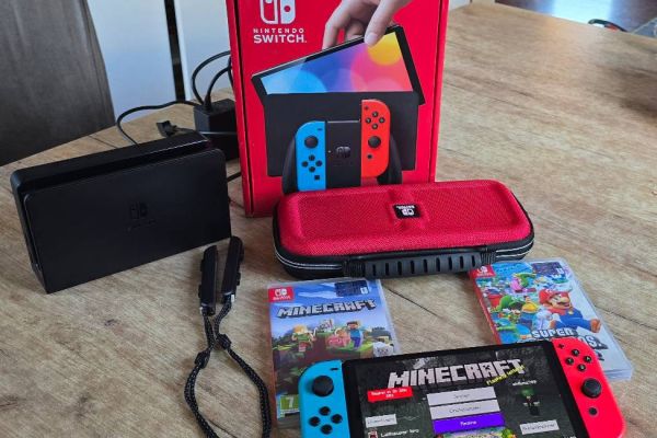 Nintendo Switch OLED + Zubehör +zwei Spiele