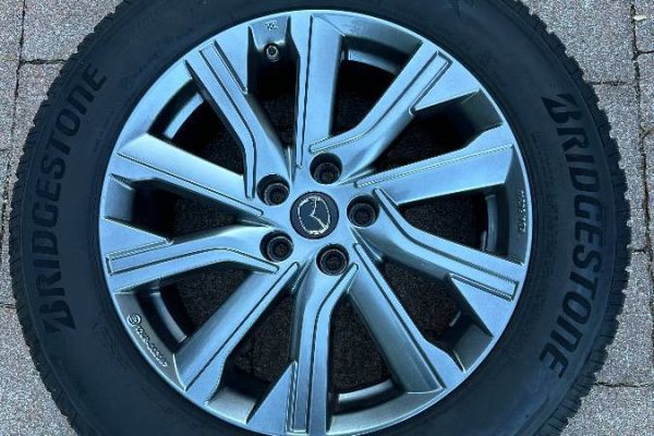 Verkaufe Winterreifen auf Felgen - Mazda