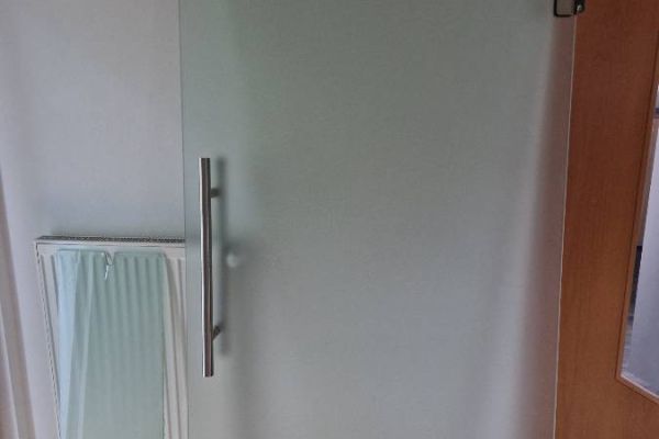 Glastür mit Oberlicht