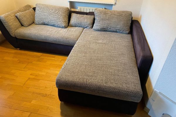 L-förmige Couch Stauraum und Bettfunktion