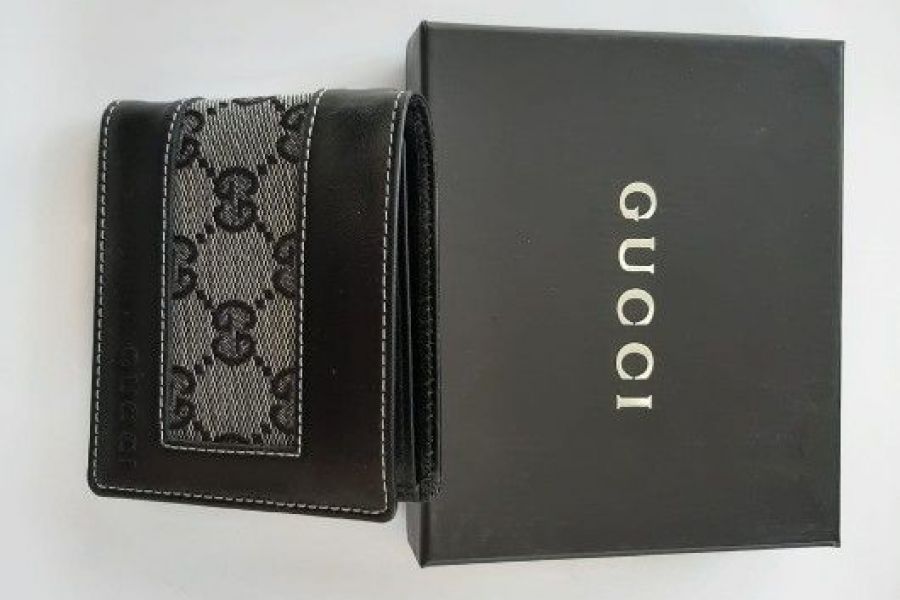 Gucci-Brieftaschen und Gucci-Anhänger - Bild 1