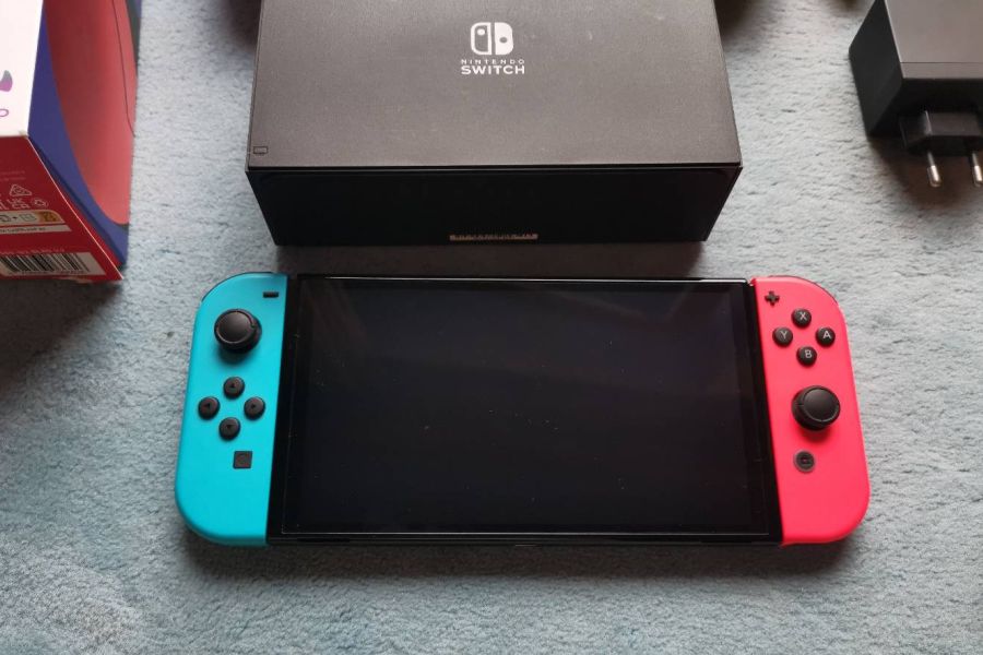 Nintendo Switch Oled mit Spiele und Zubehör - Bild 2